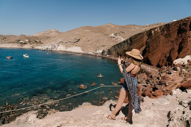 Archaeological Bus Tour To Akrotiri Excavations & Red Beach - The bus, pickup system, and pace