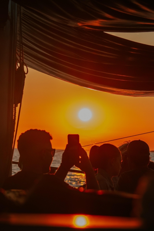 Argostoli: Sunset Cruise with Swim Stops, Dinner, and Wine - Leaving Argostoli harbor for the open sea