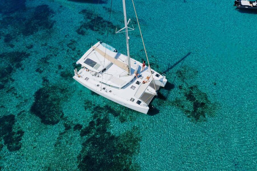 Athens: Catamaran Cruise with Fresh Lunch and Wine - Hydroussa islet: the first chance to swim from the boat