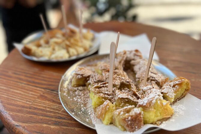 Athens Food Tour with 10+ Tastings of Greek Traditional Dishes - Hadrian’s Library and the Roman city