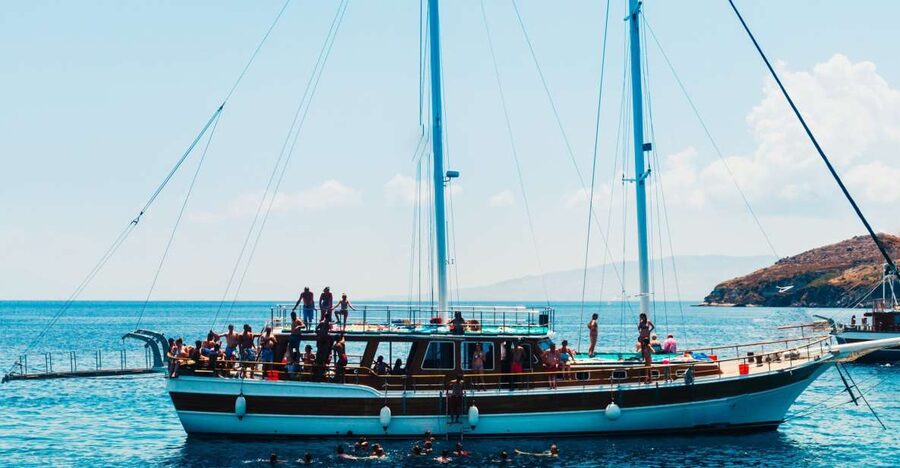 Athens: Full-Day Island Hopping Cruise with Lunch & Transfer - Agistri: pine trees, clear water, and village lanes