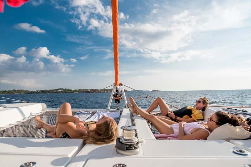 Athens: Half-Day Morning Catamaran Cruise with Meal & Drinks - Vouliagmeni Bay, lunch, and the second water stop