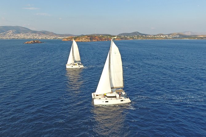 Athens Private Luxury Catamaran Cruise with Traditional Greek Meal and BBQ - Two swimming stops along the southern coast