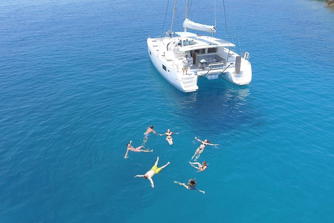 Athens Private Luxury Catamaran Cruise with Traditional Greek Meal and BBQ - A Greek meal served at sea
