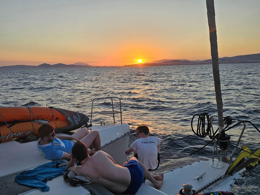Athens: Riviera Catamaran Tour with Fresh Meal and Drinks - What $144 buys you