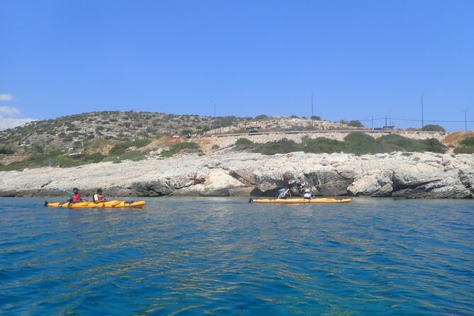 Athens Riviera: Sea Kayak and Snorkeling Adventure with Picnic - Paddling past rock formations and nearby islets