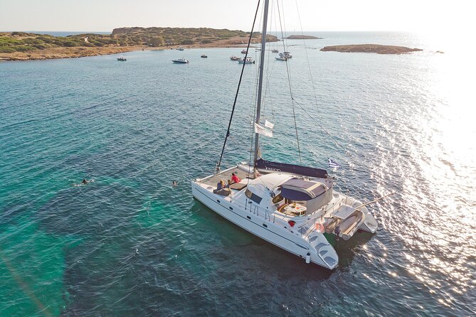 Athens Semi private Morning Catamaran cruise with meal & drinks - Megalo Kavouri: the first swim in shallow water