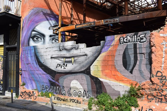 Athens street art tour - Metaxourgio and the famous Athens owl