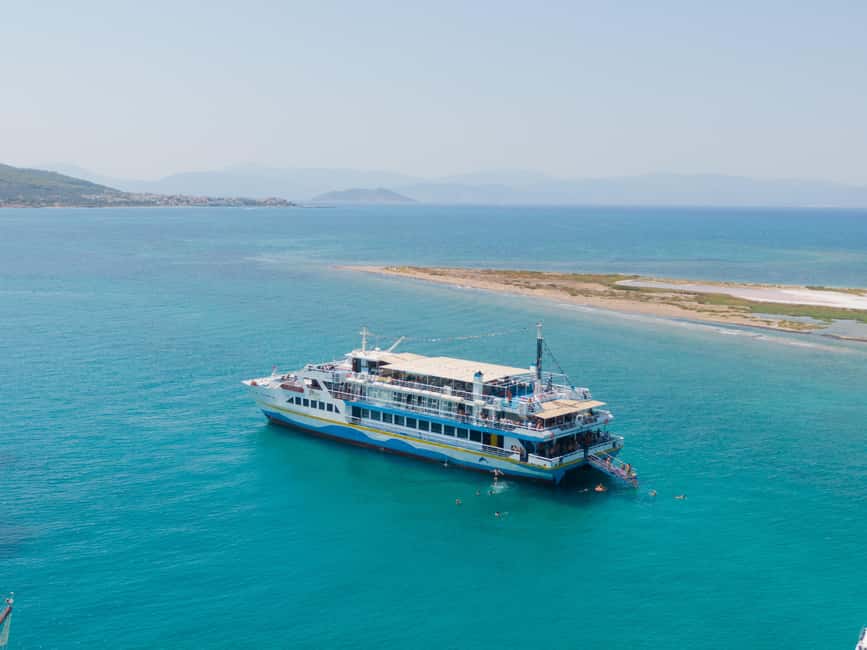 Athens: Swimming Cruise with Lunch, Wine & Live DJ on Board - Metopi is the short, exciting swim stop