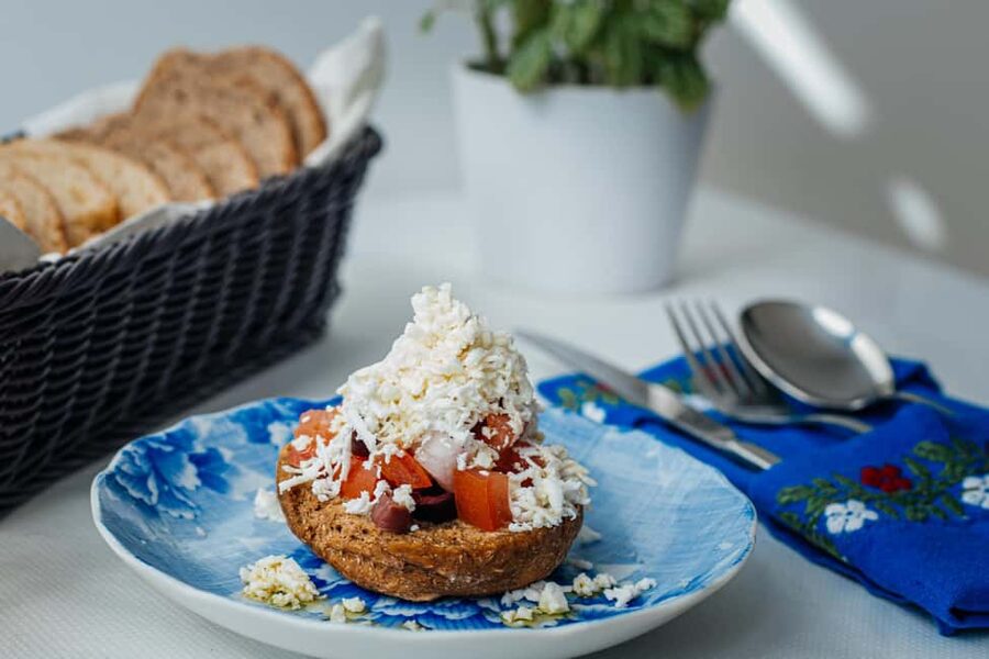 Athens: Taste of Five Signature Greek Dishes - The performance begins with a character