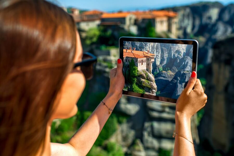 Athens to Meteora: Monasteries & Hidden Caves Bus Tour - First views of the Meteora cliffs