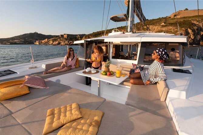 CATAMARAN Kleftiko Poliegos & Round of Milos Lunch with Openbar - Gerakas Beach and its unusual sand slopes