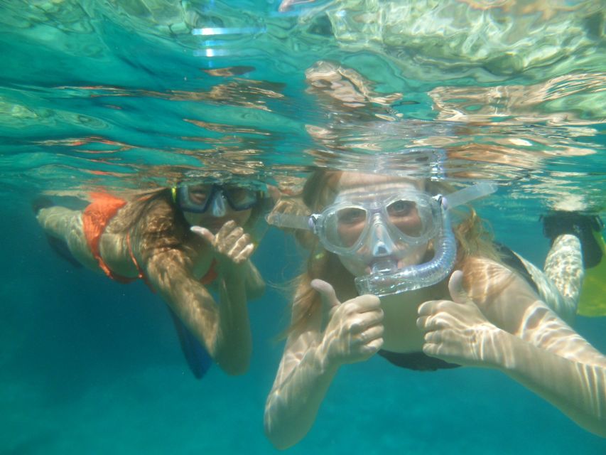 Chania: Boat Trip with Guided Snorkeling & Stand-Up Paddling - What the snorkeling stops are like
