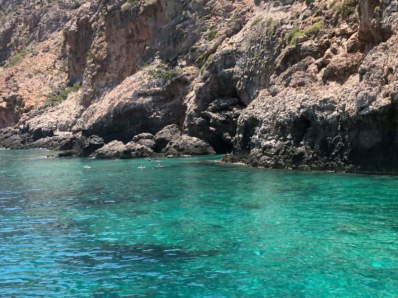 Chania: Private Cruise with Sup Food & Unlimited Drinks - Captain Giannis and Christina set the tone
