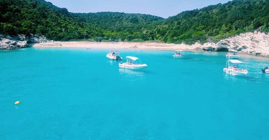 Corfu: Paxos Island Full-Day Cruise with Blue Caves - Entering the Blue Caves near Paxos