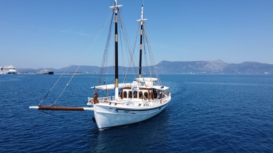 Corfu: Sunset Cruise on Classic Boat with Cocktails & Snacks - What the crew adds to the evening