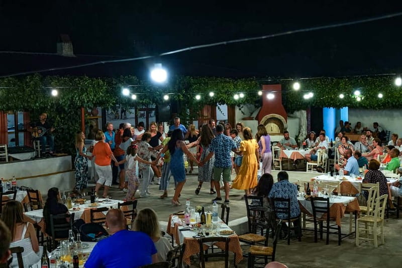 Cretan Night: Dinner & Live Show at Pano Karouzanos Village - Dinner with local wine and homemade food