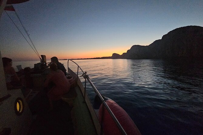 Dreamy Cruise sunset tour with dinner and unlimited wine! - Sunset over the sea before the second swim