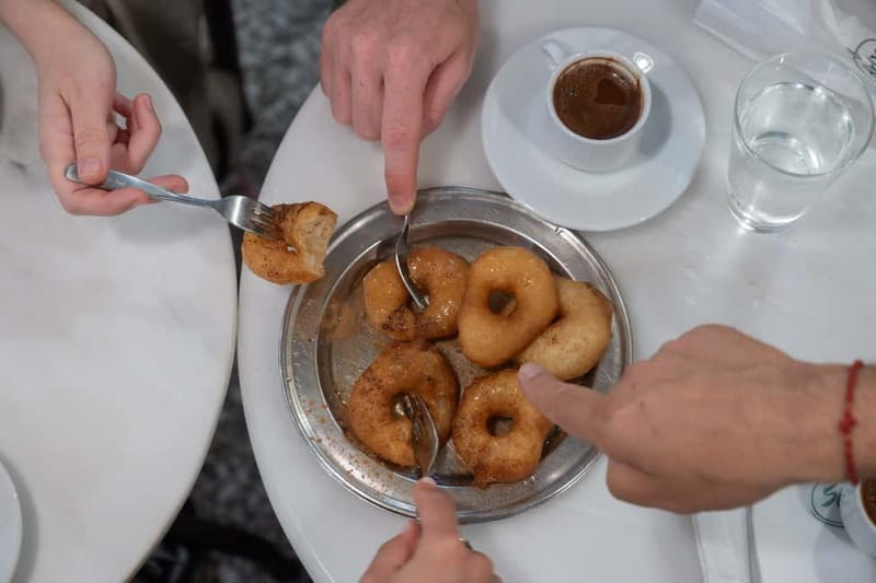 Eat Your Way Through Athens: A Local Food Walk - Cheese, sliced meats, olives, and tsipouro