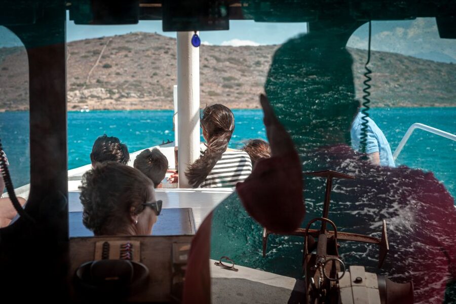 Elounda: Spinalonga Guided Boat Tour with BBQ and Swimming - The final Elounda stop and return