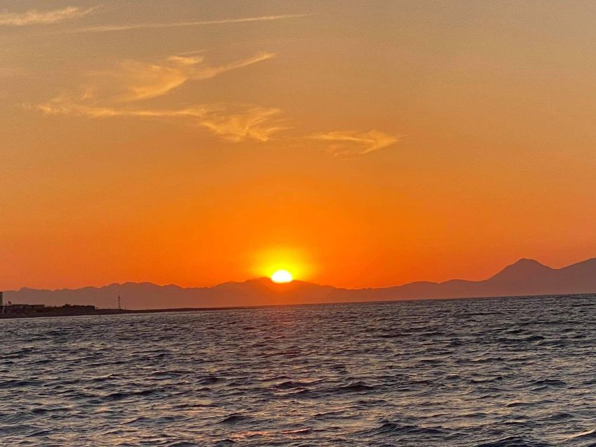 Faliraki: Evening RIB Cruise with Champagne and Sunset Views - Meeting the boat beside Stama restaurant