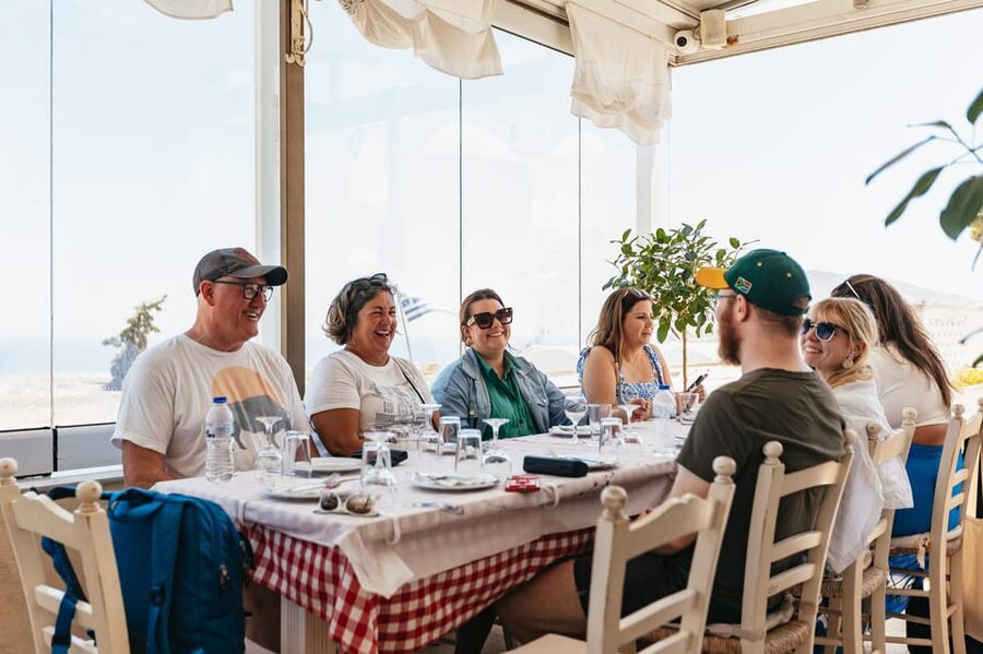 Fira: Guided Foodie Walking Tour with Tastings - A market stop and a generous tavern meal