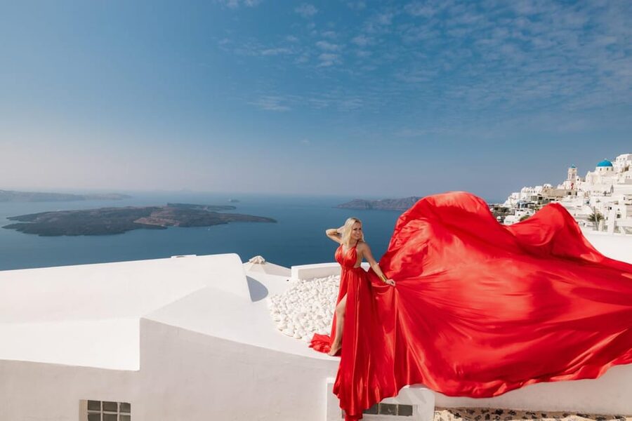 Flying dress Photoshoot in Santorini with Hotel Pickup - Imerovigli gives you the signature Santorini backdrop