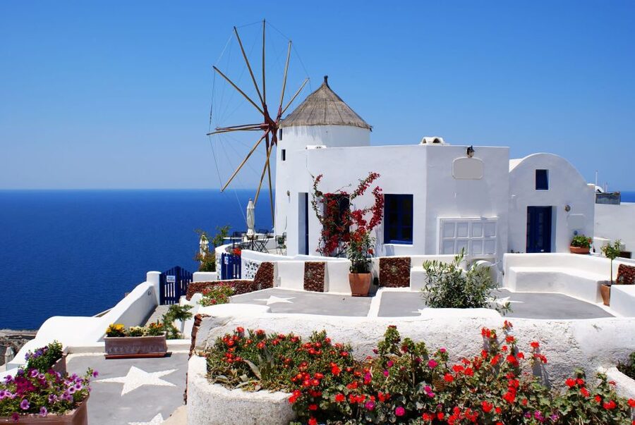 From Athens: 2-Day Santorini and Mykonos Trip - Breakfast, port transfer, and the short crossing to Mykonos