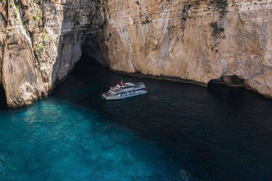 From Benitses/Lefkimmi: Paxos, Antipaxos & Caves Day Cruise - The long blue-water run from Corfu