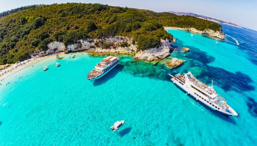 From Corfu: Day Cruise to Paxos, Antipaxos, and Blue Caves - Leaving Corfu after an early start