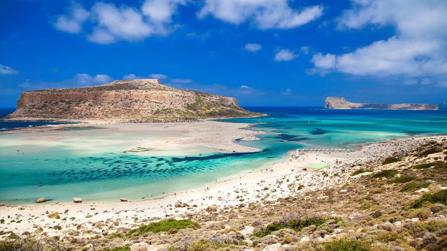 From Heraklion: Cruise to Balos Lagoon and Chania Old Town - Balos Beach: swimming, rocks, and bright water