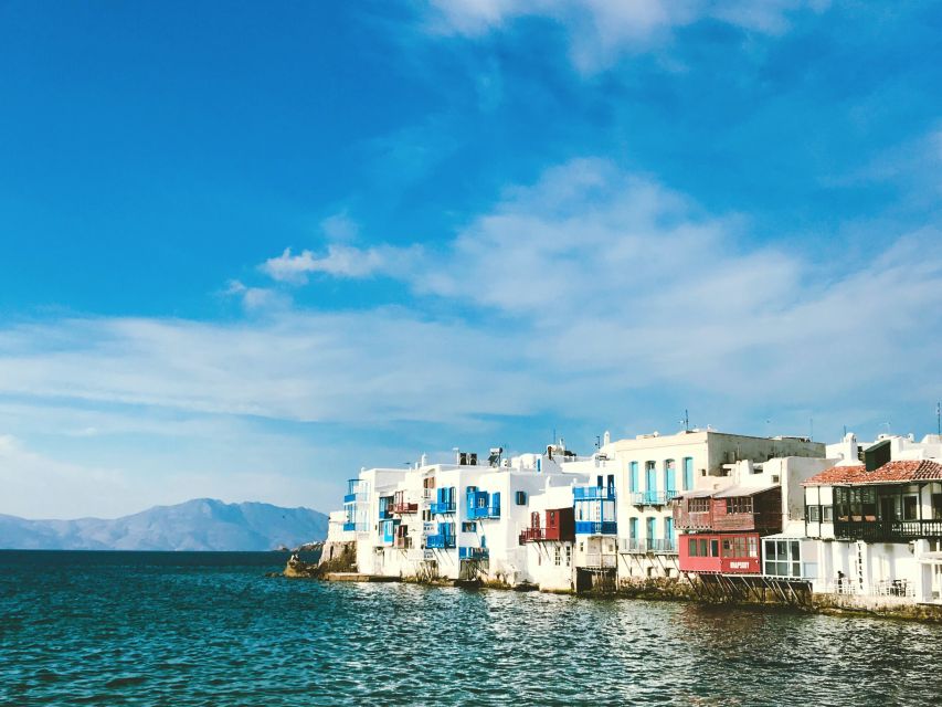 From Paros: Delos & Mykonos Full-Day Trip by Catamaran - Boarding the catamaran from Paros