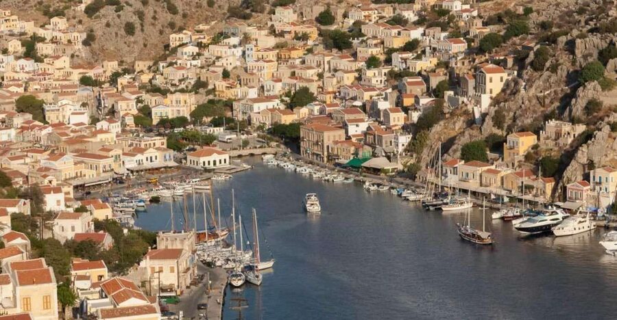From Rhodes: Boat Trip to Symi Island with Hotel Transfer - Arriving at Symi’s pastel harbor