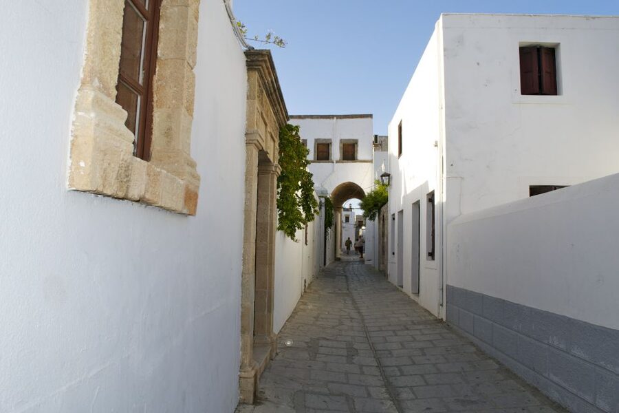 From Rhodes: Lindos Village and Acropolis Guided Tour - The east-coast ride in an air-conditioned bus
