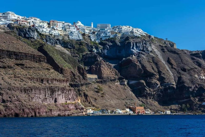 From Santorini: Volcano Cruise With Oia Sunset - Reaching Oia For The Sunset
