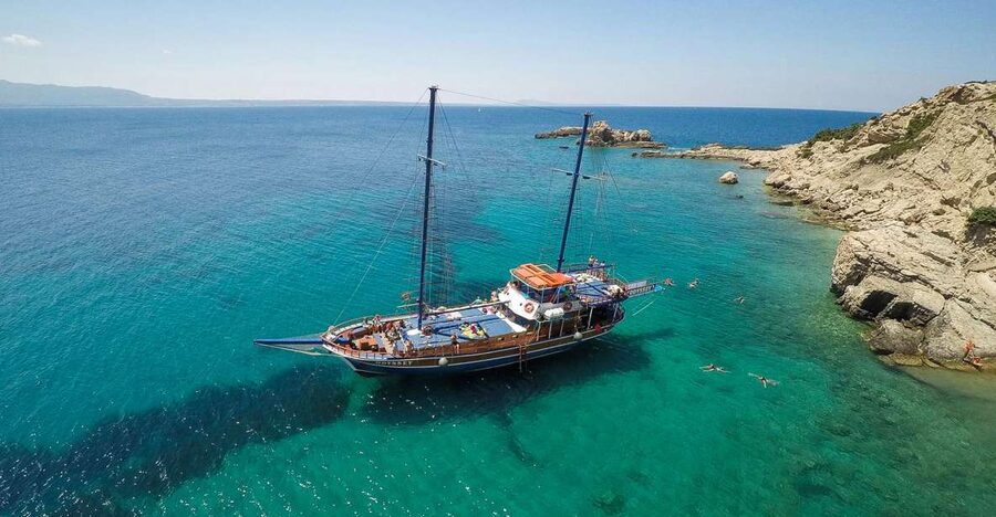 From the Port of Kos: Full Day Boat Cruise to 3 Islands - Dolphins, fish farms, and the open-water part of the day