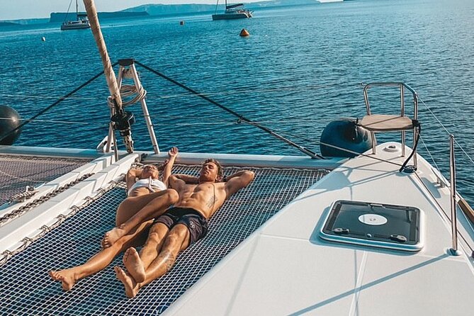 Half-Day Exclusive Catamaran Cruise in Santorini with Meal and Open Bar - From your hotel to Vlychada Marina