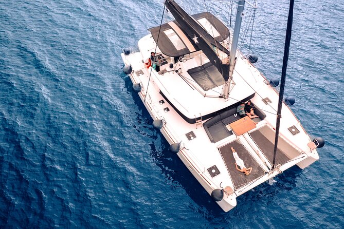 Half Day Premium Catamaran Cruise in Santorini including Oia - Red Beach and the first swim