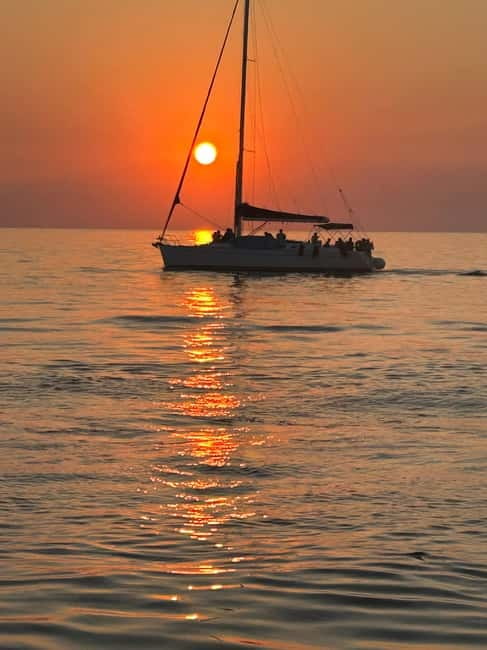 Heraklion: Dia Island Sunset Boat Tour with Dinner - Sunset over the Aegean Sea