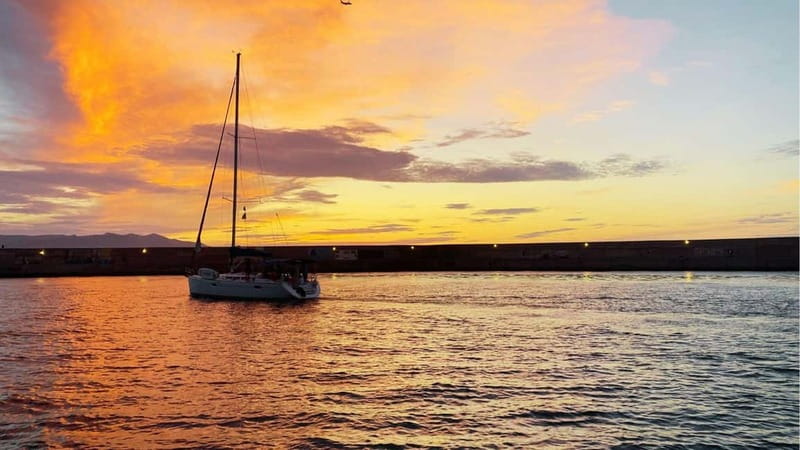 Heraklion: Dia Island Sunset Boat Tour with Dinner - Pickup, port details, and the six-hour schedule