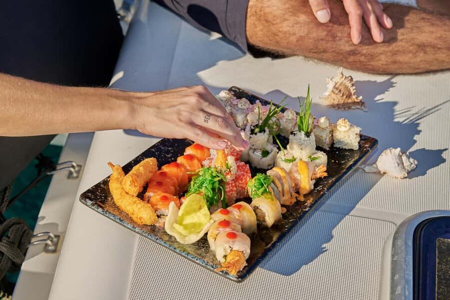 Hersonissos: Sunset Catamaran Cruise with Snacks and Drinks - The first hour, coastal views and easy sailing