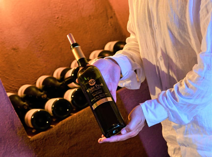 Imerovigli: Premium Wine Tasting with Caldera and Sea Views - The vineyard walk and Santorini’s basket-shaped vines