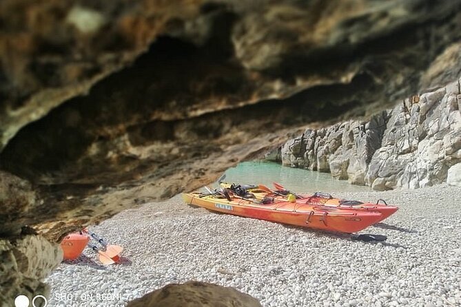 Kayak Trip to Hidden blue Cave, with lunch & fruits. - Entering the hidden Blue Cave