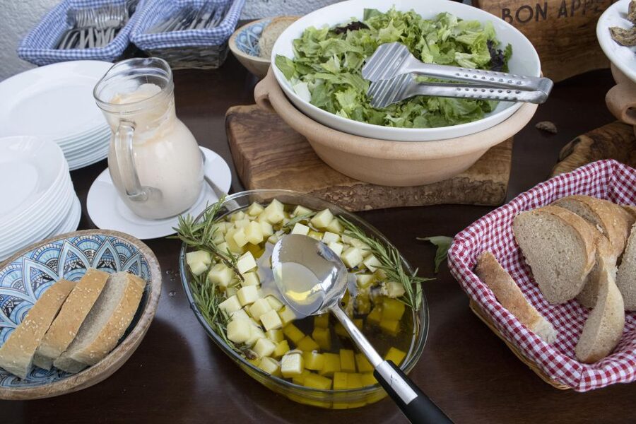 Kissamos: Greek Night with Buffet Dinner and Plate Smashing - A former prison with a 15.3-meter dinner table