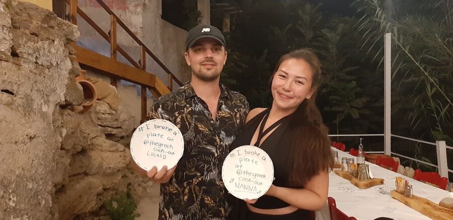 Kissamos: Greek Night with Buffet Dinner and Plate Smashing - Learning Cretan steps before breaking plates