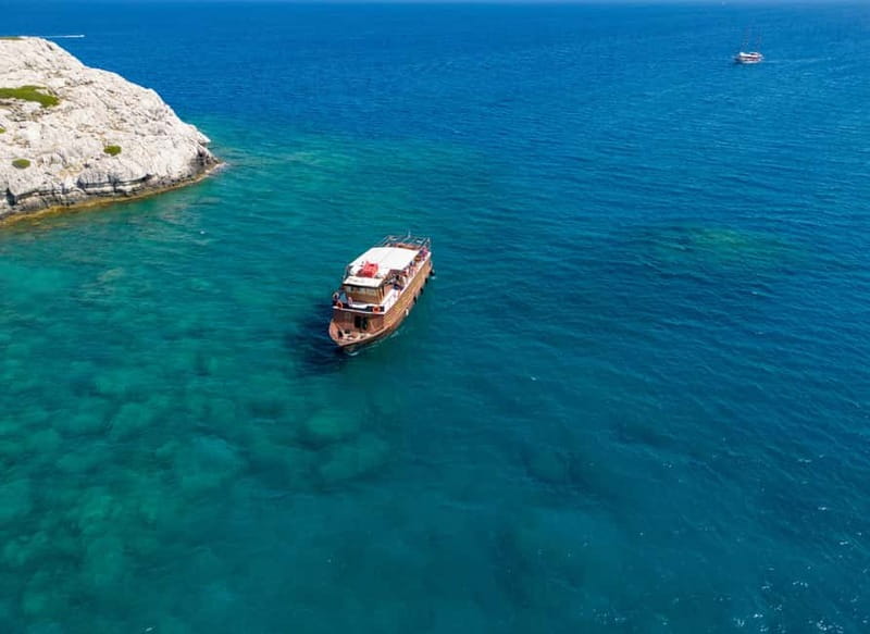 Kolympia : Transfer & Cruise to Lindos with 3 Swimming Stops - The coach pickup keeps the morning simple