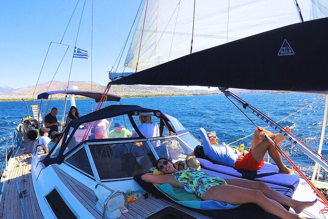Kos: Small Group Full-Day Sailing with Meal, Drinks, & Swim - The crew makes the small boat work