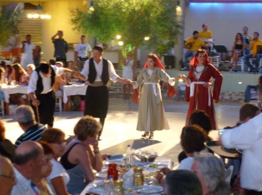 Kos: Tavern Dinner Experience with Greek Dancing and Wine - Arriving at the taverna and taking your seat