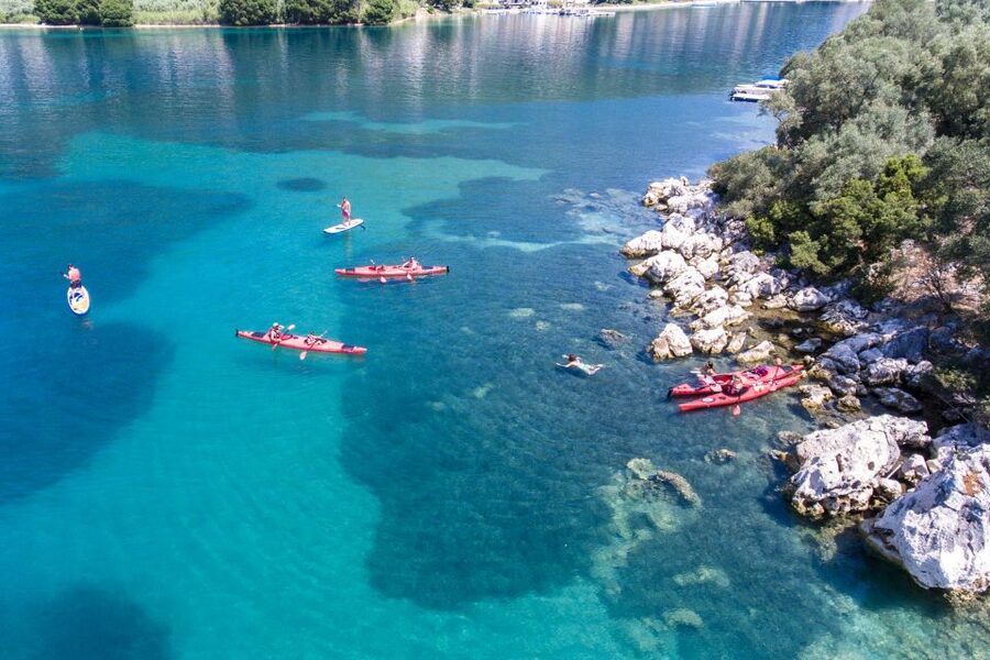 Lefkada: Full Day Sea Kayaking Tour - Paddling three miles to Red Rock Beach