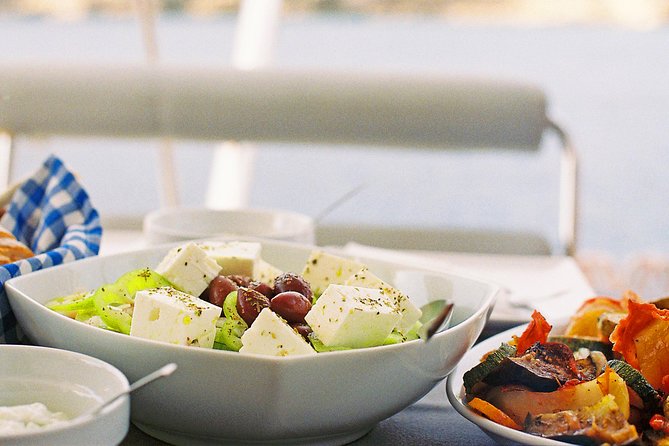 Luxury Catamaran Cruise from Athens with Traditional Greek Meal and BBQ - Boarding the catamaran and meeting the crew